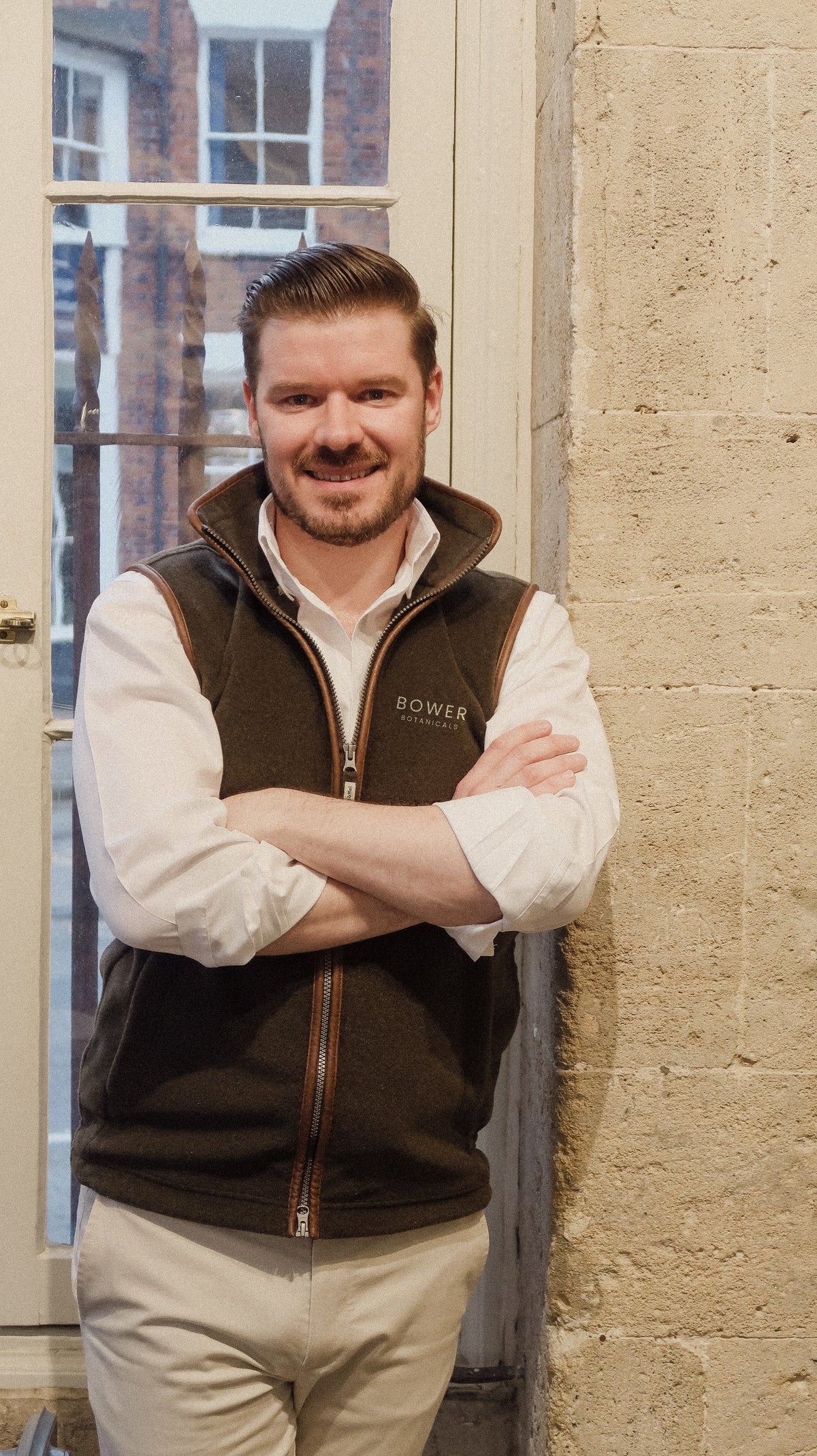 Bower x Schöffel Oakham Fleece Gilet worn, with embroidered Bower Botanicals wordmark